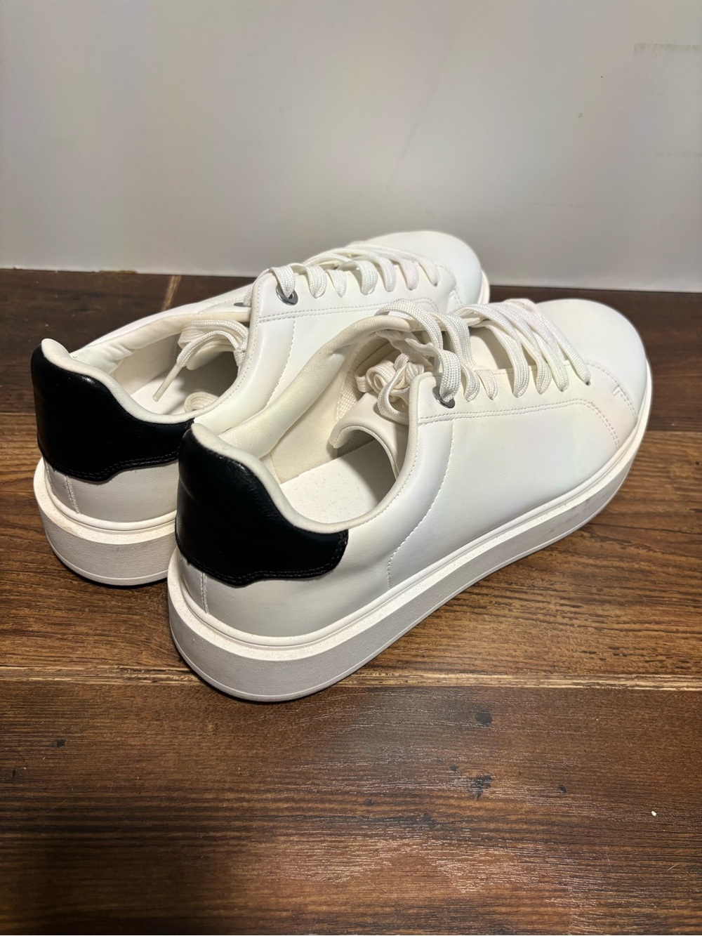 Women’s White Leather Torrid Sneakers with Black Heel Accent